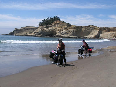 Mom and I dip our wheels, while Dad says he doesn't
 want sand and salt water getting on his bike